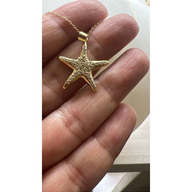 COLGANTE ESTRELLA. ORO 18K