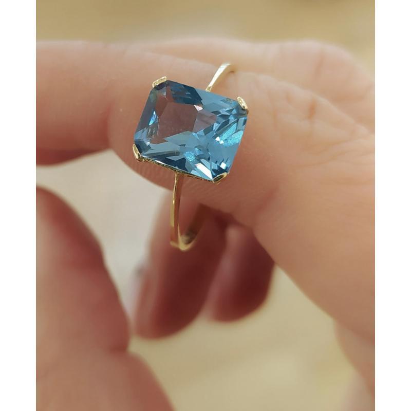 ANILLO TOPACIO AZUL. ORO 18K 